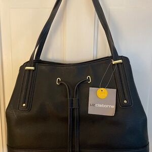 Black new with tags black Liz Claiborne purse.